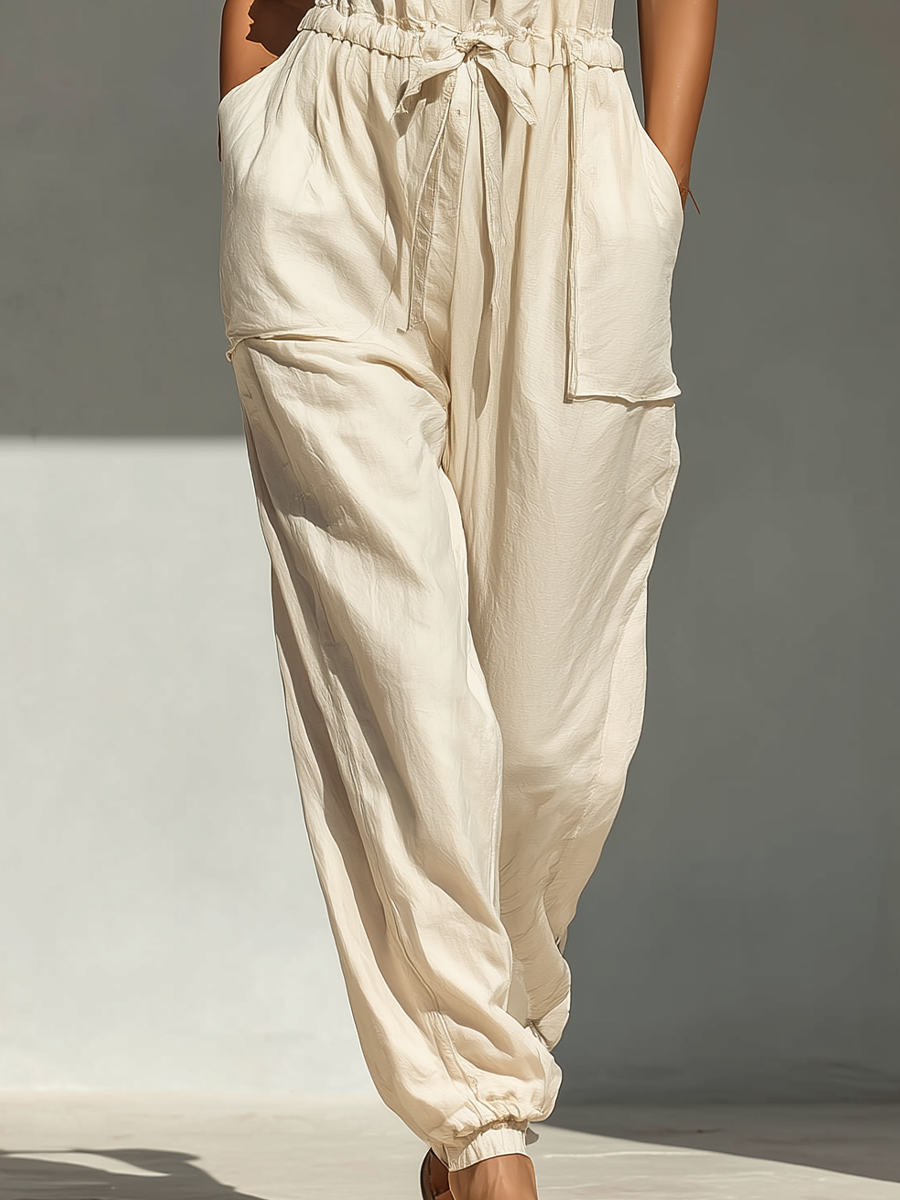 Women’s Cream Ruffled-Trim Sleeveless Jumpsuit With Drawstring Waist & Jogger Pants MDZ2858E5T