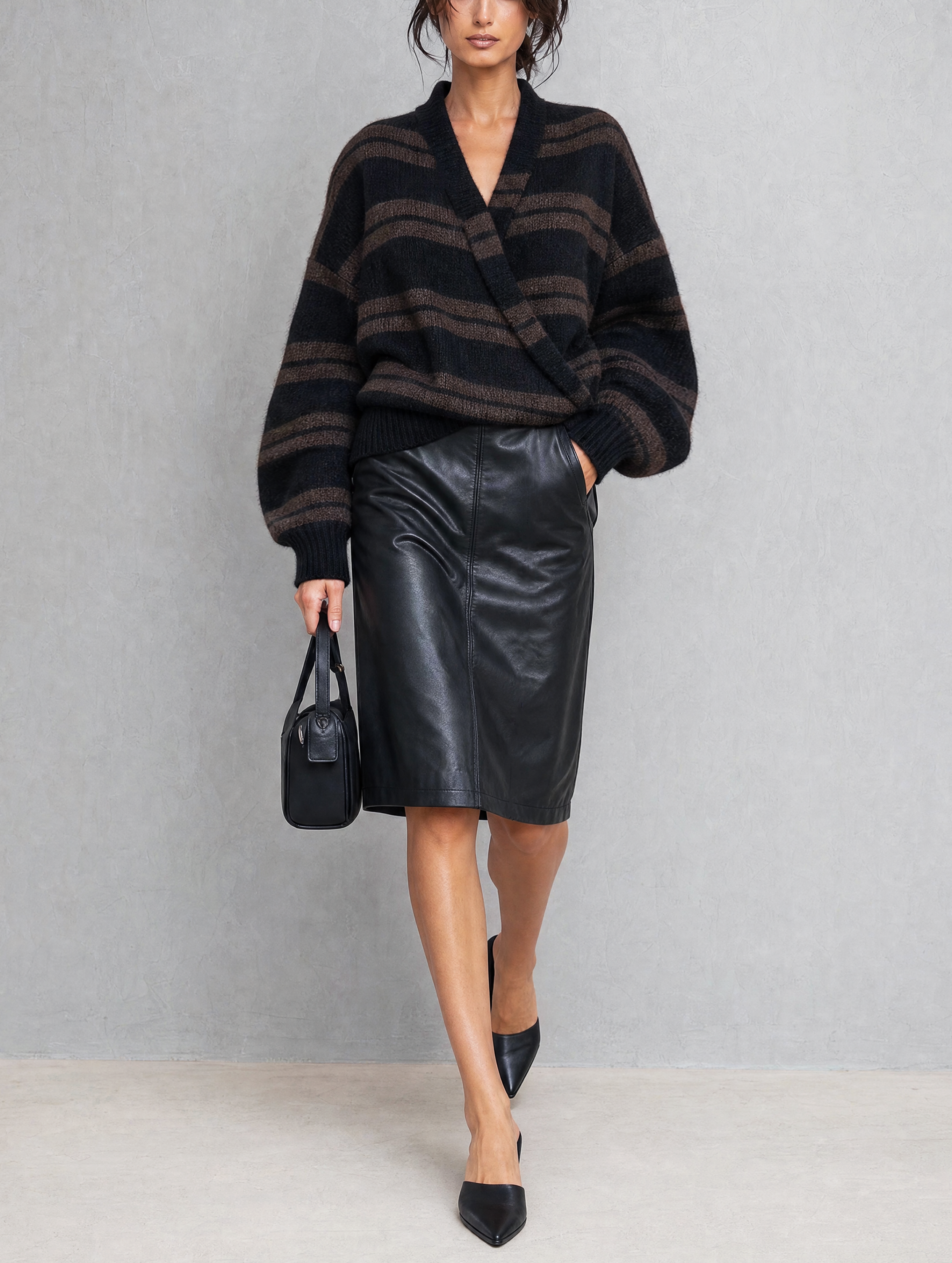 Women's Casual Black V-Neck Long-Sleeve Knit Sweater And A Leather Mini Skirt Two-Piece Set MDZ2713H4LXY