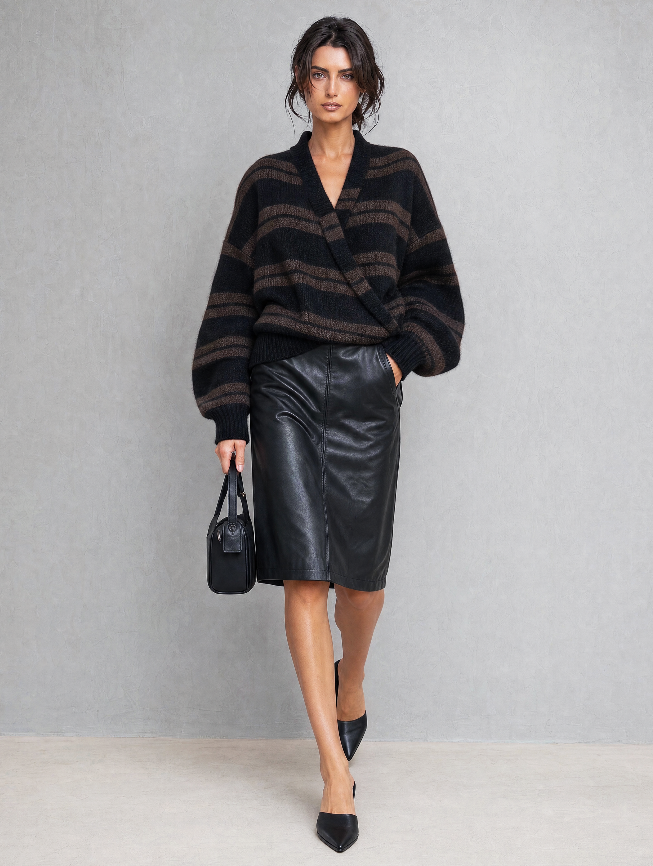 Women's Casual Black V-Neck Long-Sleeve Knit Sweater And A Leather Mini Skirt Two-Piece Set MDZ2713H4LXY