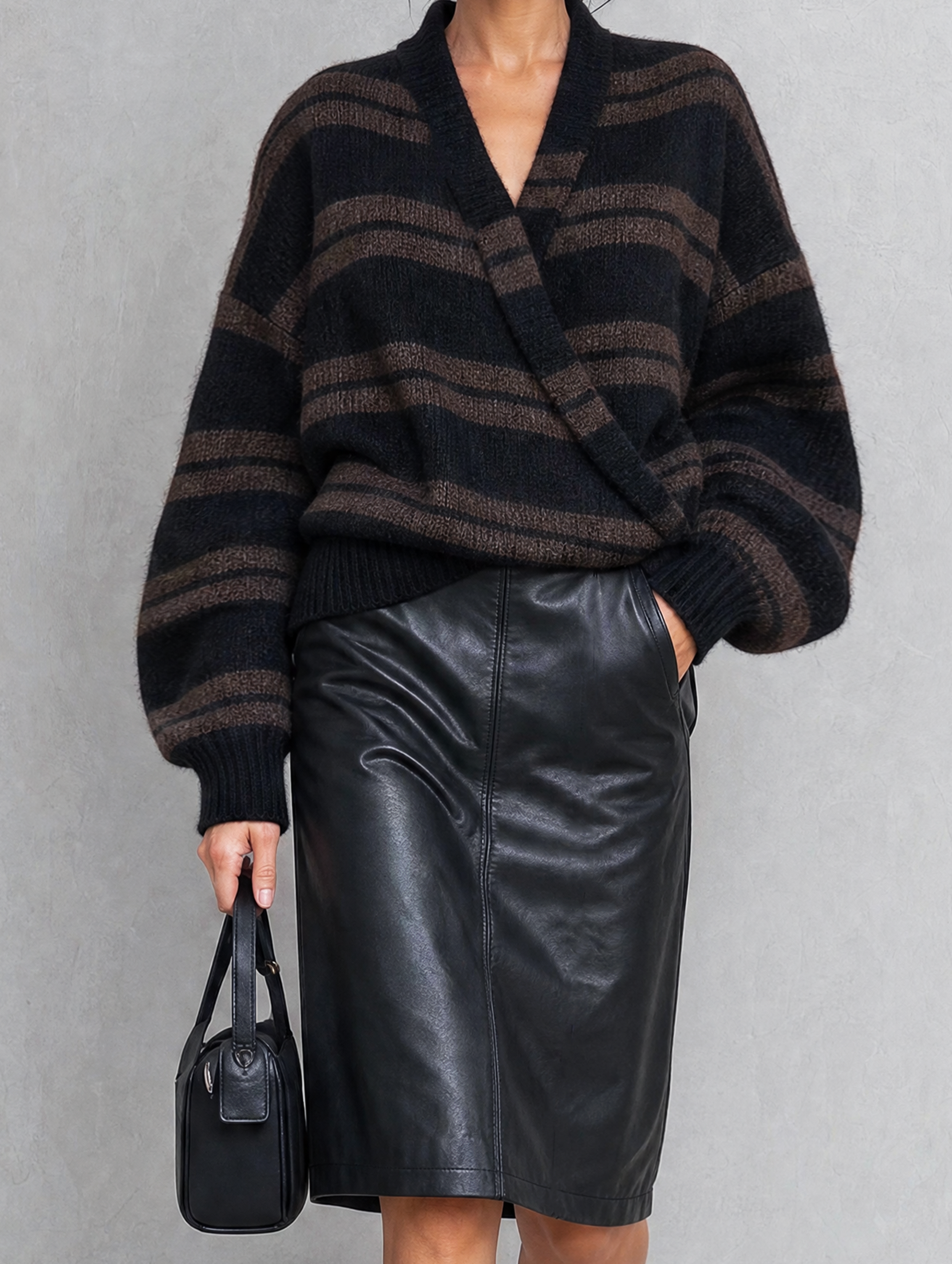 Women's Casual Black V-Neck Long-Sleeve Knit Sweater And A Leather Mini Skirt Two-Piece Set MDZ2713H4LXY