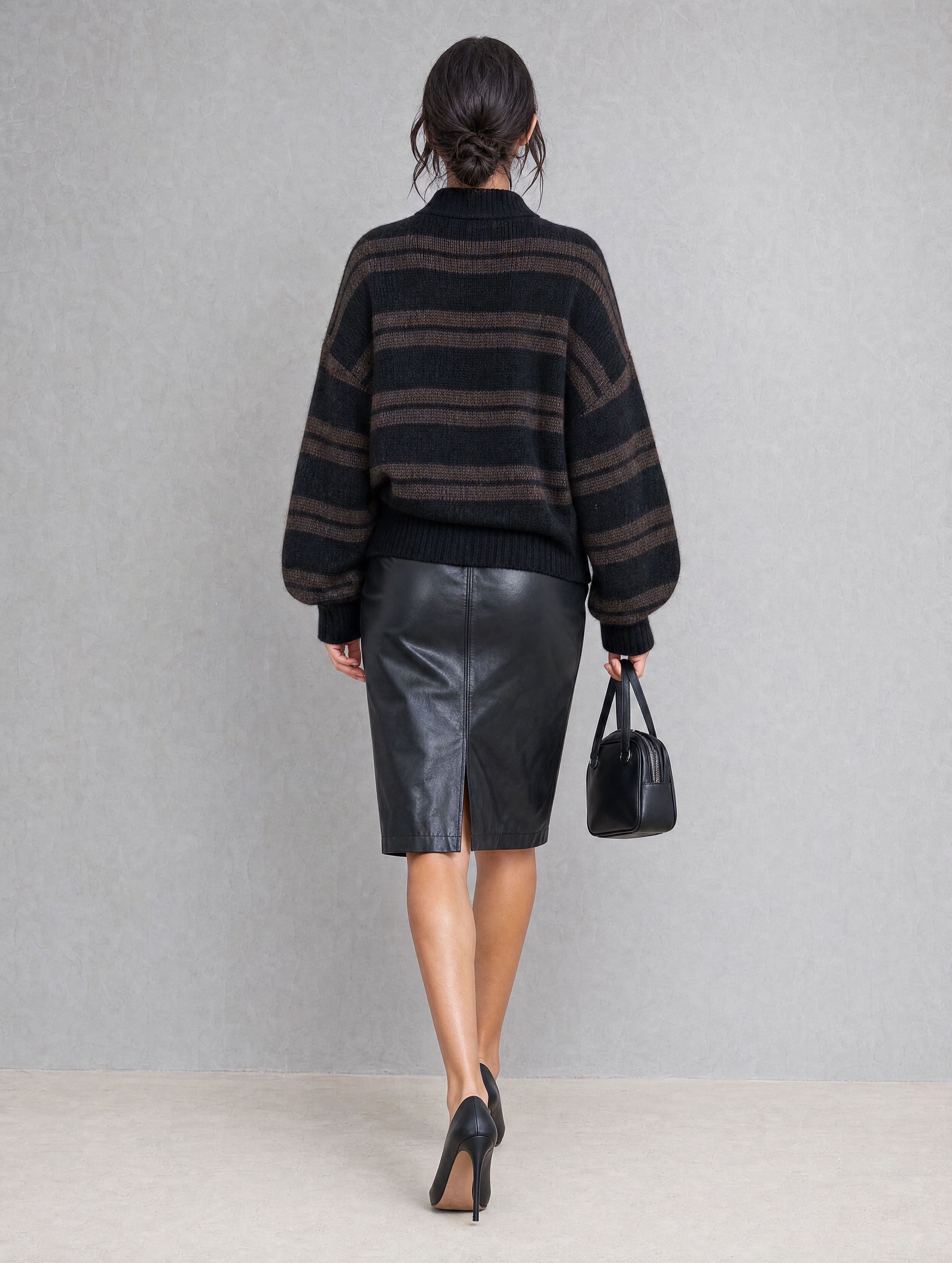 Women's Casual Black V-Neck Long-Sleeve Knit Sweater And A Leather Mini Skirt Two-Piece Set MDZ2713H4LXY