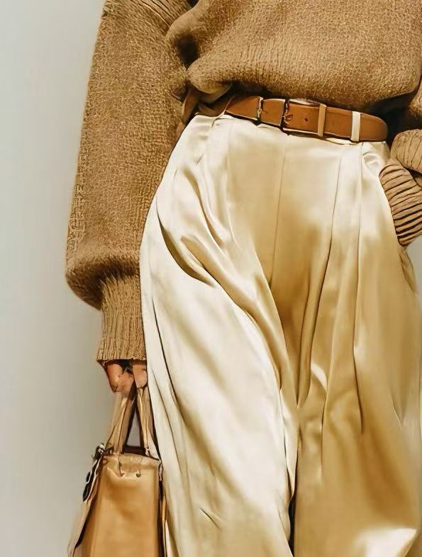 Woman's Elegant And Gentle Style Features A Camel-colored Loose-fitting Sweater With A Turn-down Collar, Paired With Beige Satin Wide-leg Cropped Trousers With A Glossy Finish MDA0680K4AN